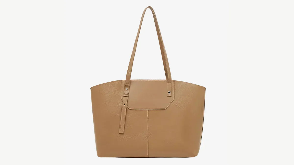 Cuirae brown vegetable-tanned top-grain leather shoulder tote shown from the front on a clean background.