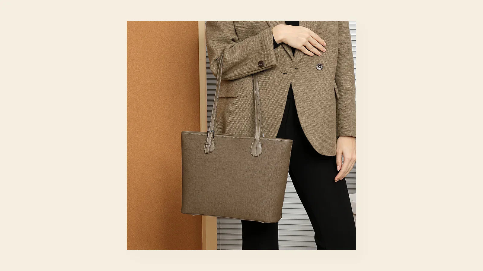 Cuirae leather work tote carried with a neutral blazer for a practical work bag packing guide