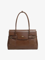 Cuirae brown top-grain leather everyday tote bag with top handles and gold hardware, front view on white background