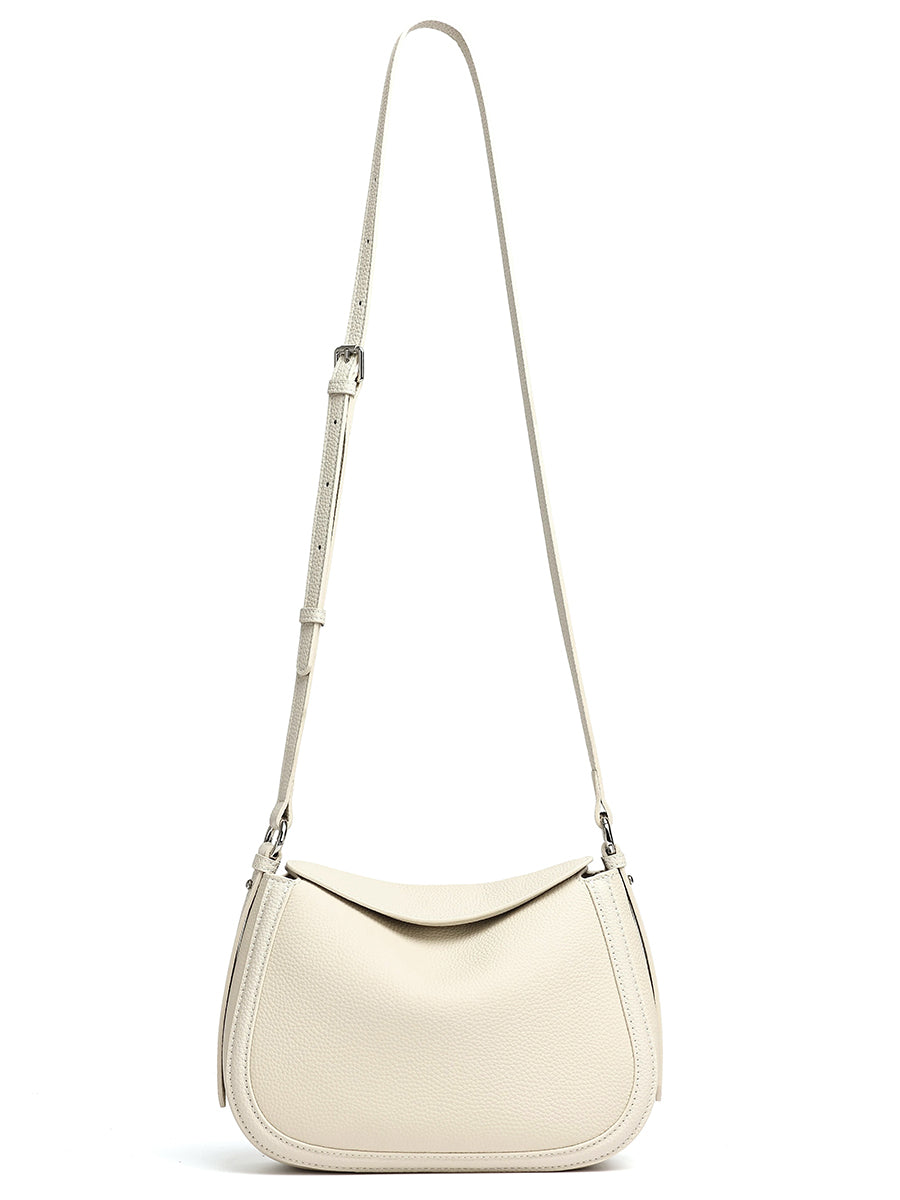 Ivory shoulder bag with its longer adjustable strap