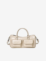Cuirae off beige genuine leather bowling crossbody bag with double pockets, front view showing smooth leather texture
