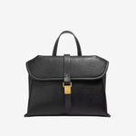 Cuirae black genuine leather flap handbag with gold buckle and contrast stitching, front view on white background