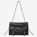 Cuirae black genuine leather flap messenger shoulder bag for women with thin shoulder strap, front view on white background