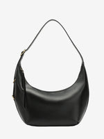 A front view of the Cuirae black genuine leather handbag with a curved shape and an adjustable strap on a plain white background.