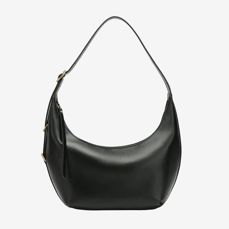 The Cuirae black genuine leather handbag.