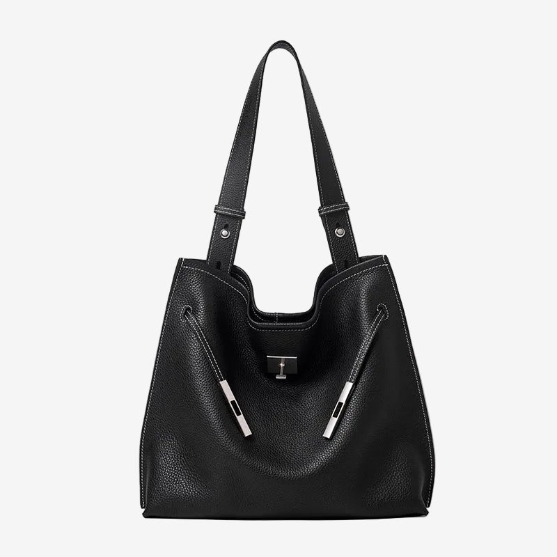 A front view of the Cuirae black genuine leather tote bag standing on a plain background.