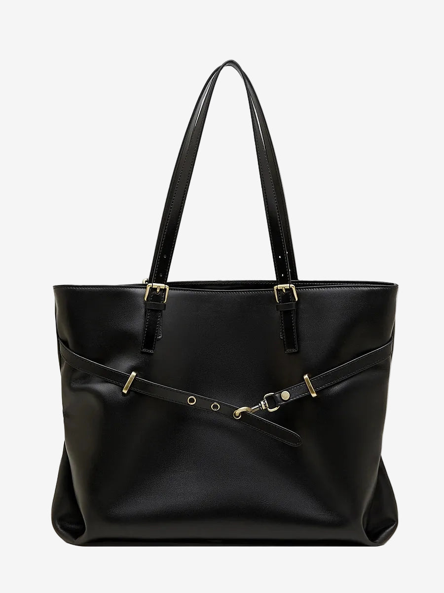 A front view of the Cuirae black genuine leather tote bag standing on a plain background.