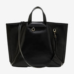Cuirae black genuine leather tote bag for women with top handles and detachable shoulder strap, front view on white background