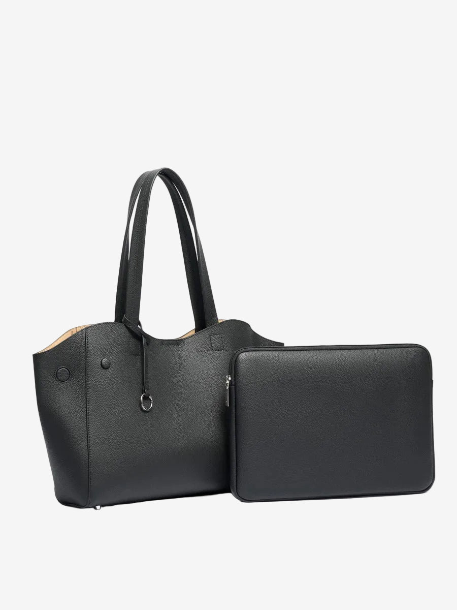 Cuirae black genuine leather tote bag displayed beside a matching black zippered pouch on white background