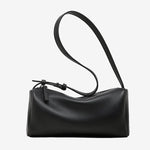 Cuirae black pebbled genuine leather barrel crossbody bag with adjustable strap, front view on white background