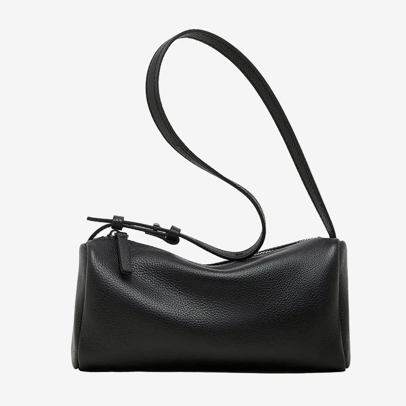 Cuirae black pebbled genuine leather barrel crossbody bag with adjustable strap, front view on white background