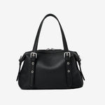 Cuirae black pebbled genuine leather bowling shoulder bag with silver hardware and top handles, front view on white background