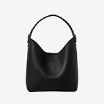 Cuirae black pebbled genuine leather bucket bag with black braided top handle, front view on white background