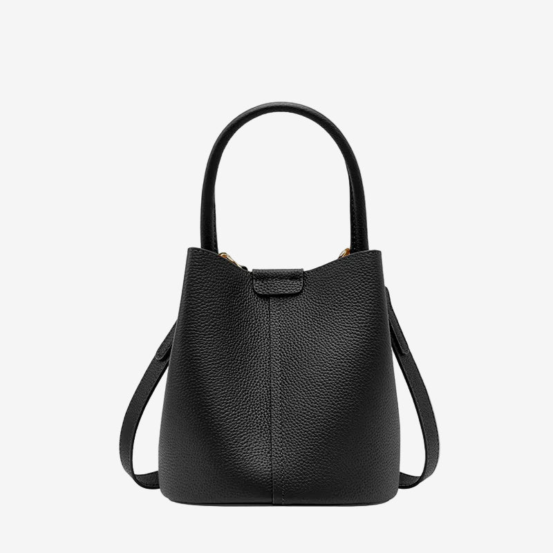 Cuirae black pebbled genuine leather bucket bag with top handle and detachable strap, front view on white background