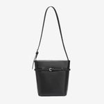 Cuirae black pebbled genuine leather bucket bag with waist belt buckle and silver hardware, front view on white background