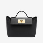 Cuirae black pebbled genuine leather flap kelly crossbody bag with gold turnlock hardware, front view on white background
