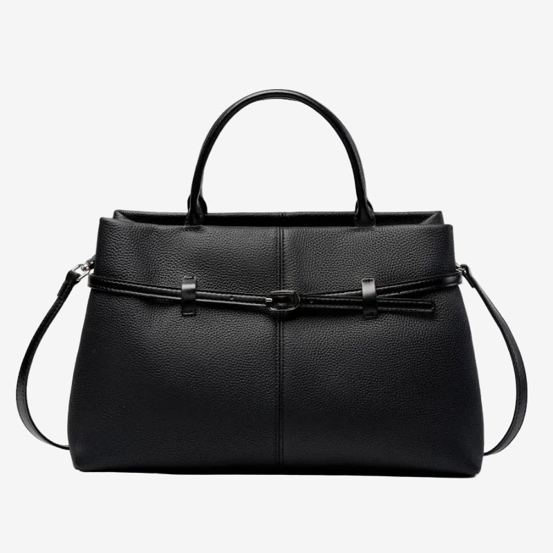 Cuirae black pebbled genuine leather handbag with belt buckle detail and silver hardware, front view on white background