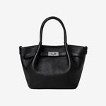 Cuirae black pebbled genuine leather kelly crossbody bag with silver turnlock hardware, front view on white background