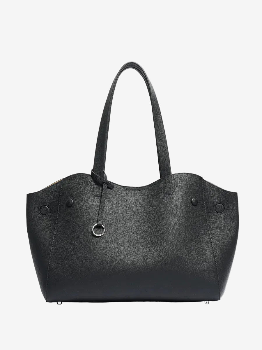 Cuirae black pebbled genuine leather tote bag with long handles and silver ring charm, front view on white background