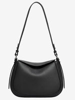 Black Cuirae pebbled leather shoulder bag with an adjustable strap, front view