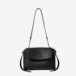 Cuirae black pebbled top-grain leather flap shoulder and crossbody bag, front view