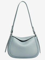 Blue Cuirae pebbled leather shoulder bag with an adjustable strap, front view