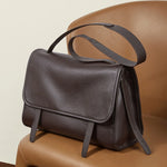 Cuirae  brown full grain leather shoulder messenger bag, angled view showing soft premium leather texture