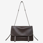 Cuirae brown genuine leather flap messenger shoulder bag for women with thin shoulder strap, front view on white background