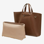 Cuirae brown genuine leather tote bag for women with detachable shoulder strap and matching beige pouch, front view on white background