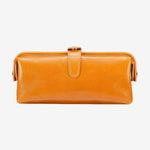 Cuirae brown glossy genuine leather makeup bag with buckle closure, front view on white background