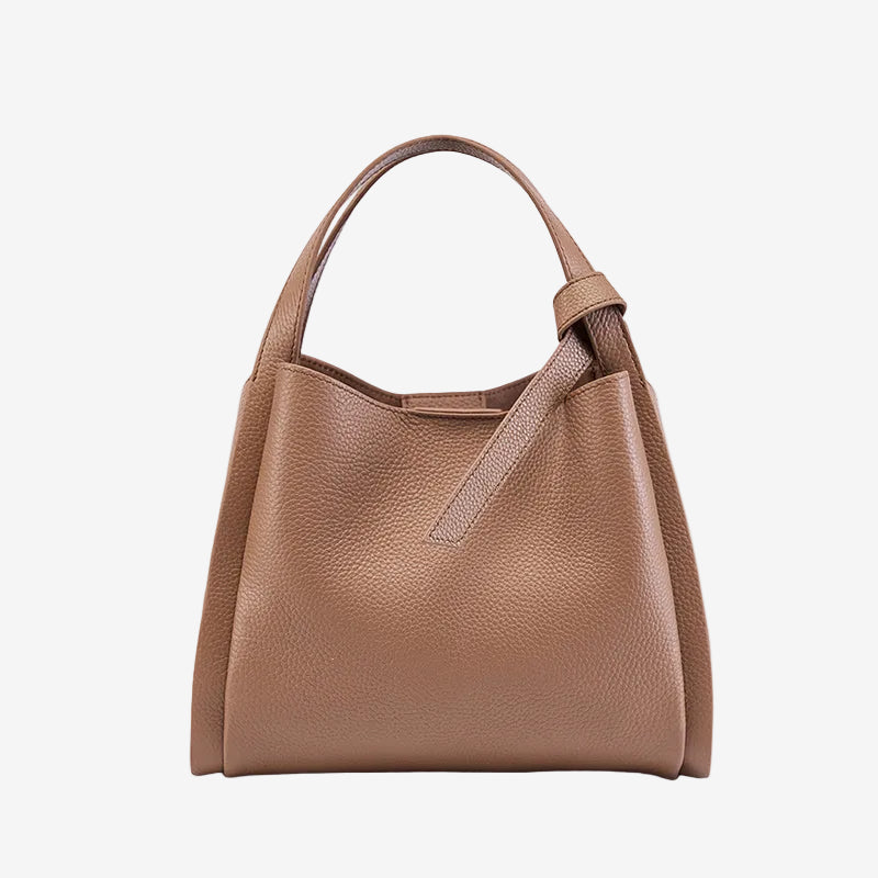 Cuirae brown pebbled genuine leather handbag with top handle and detachable shoulder strap, front view on white background