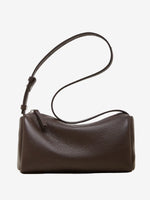 Cuirae brown pebbled genuine leather barrel crossbody bag with adjustable strap, front view on white background