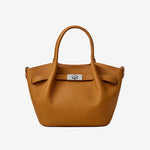 Cuirae brow pebbled genuine leather kelly crossbody bag with silver turnlock hardware, front view on white background