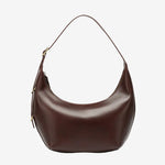 The Cuirae chocolate genuine leather handbag.