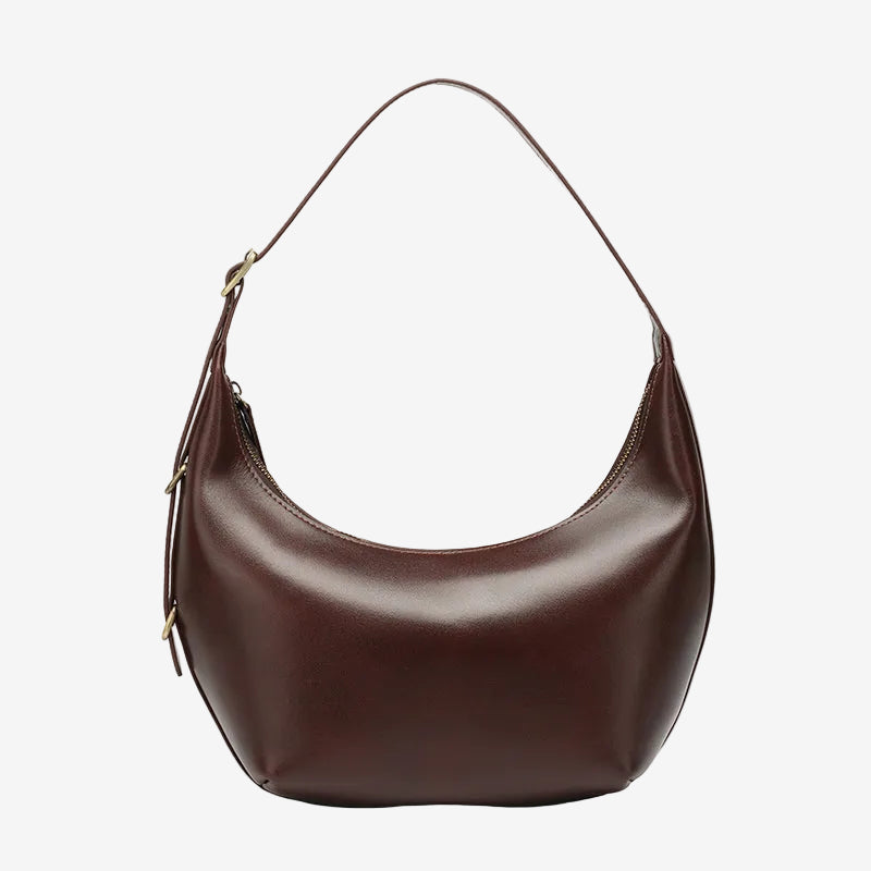 The Cuirae chocolate genuine leather handbag.