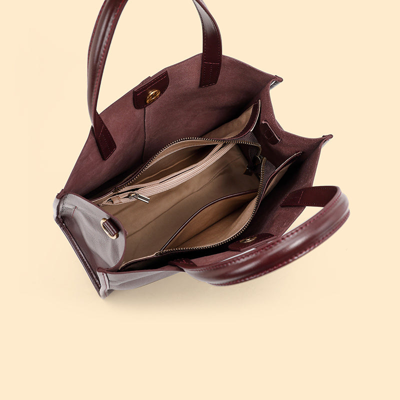 A look inside the Cuirae coffee genuine leather bag showing the space.