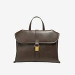 Cuirae coffee genuine leather flap handbag with gold buckle and contrast stitching, front view on white background