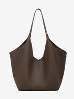 A front view of the Cuirae coffee genuine leather tote bag standing on a plain background.