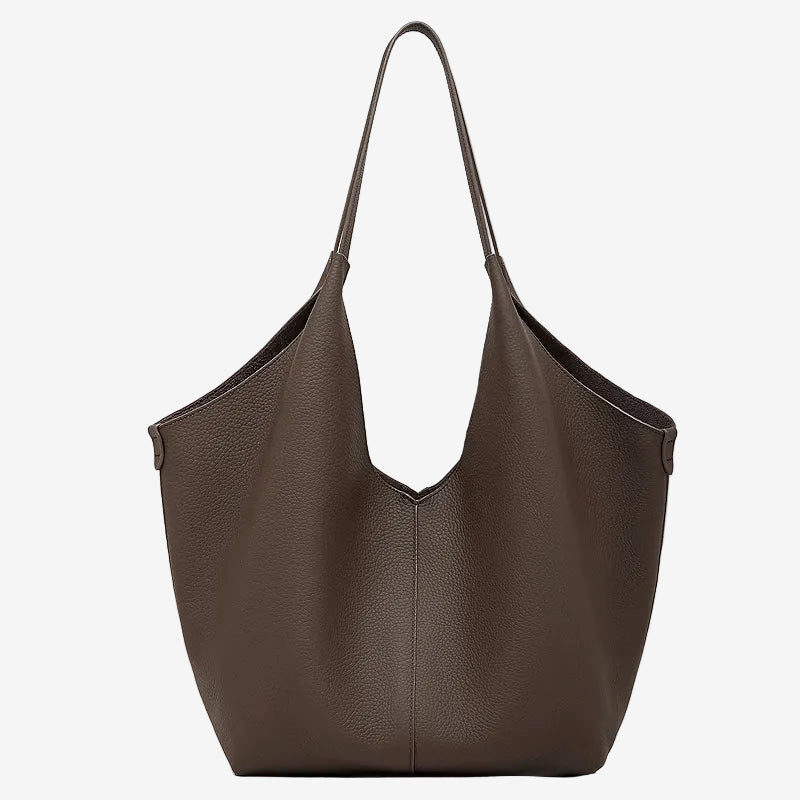 A front view of the Cuirae coffee genuine leather tote bag standing on a plain background.