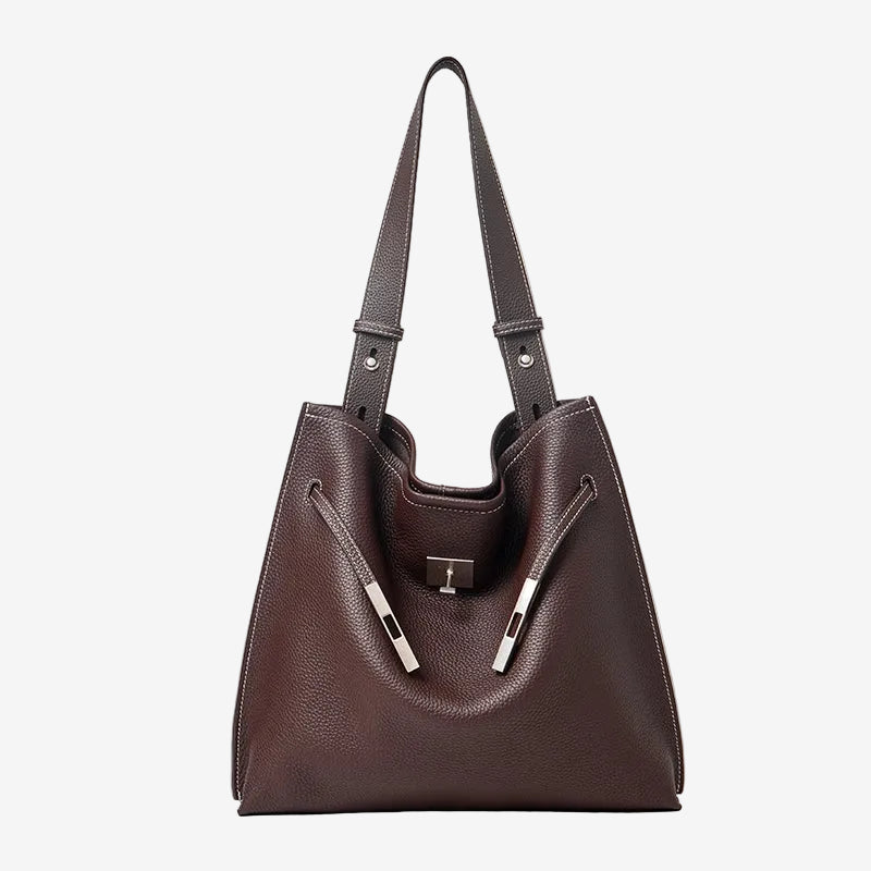 A front view of the Cuirae coffee genuine leather tote bag standing on a plain background.