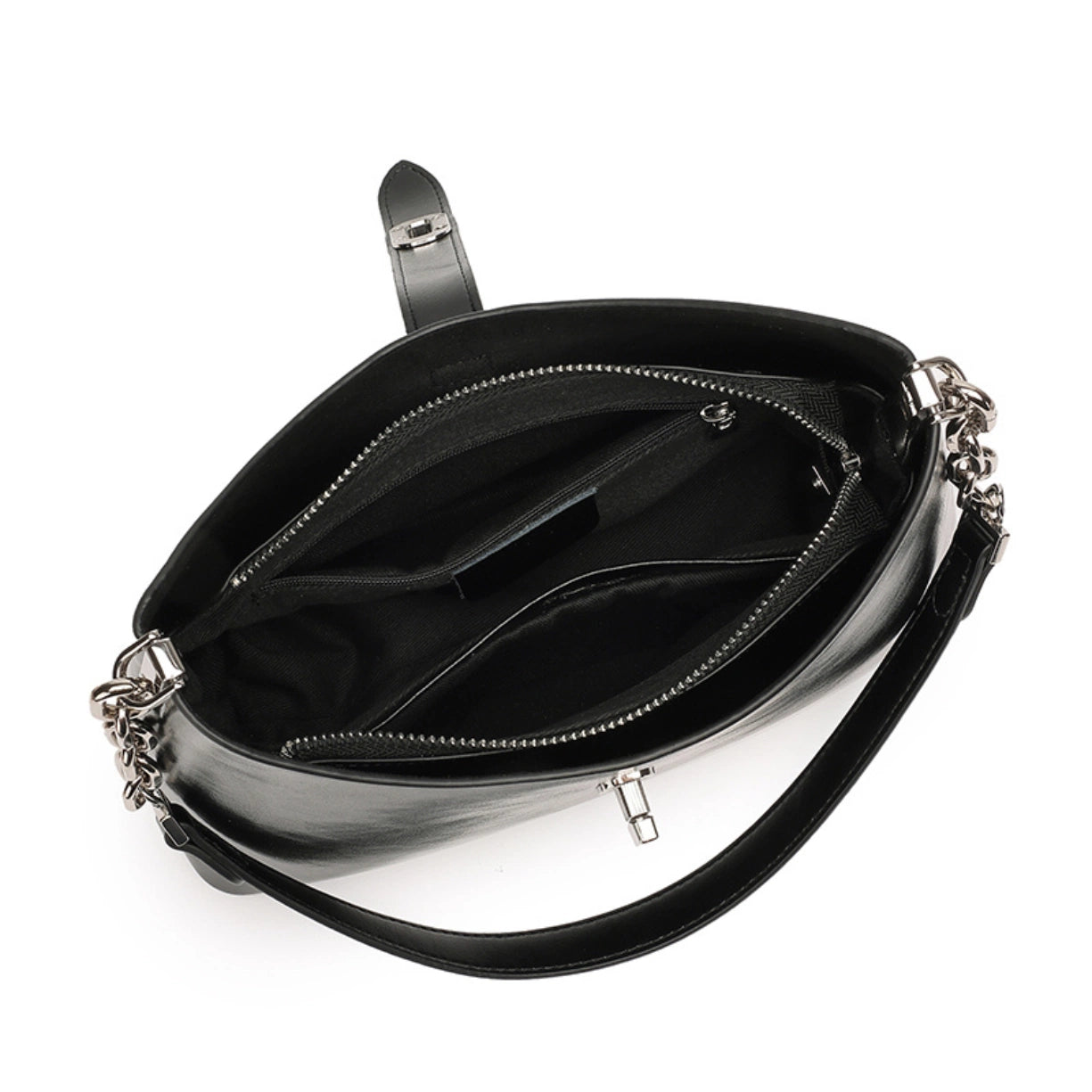 Inside view of the Cuirae bag showing the middle zip divider and roomy open pockets.