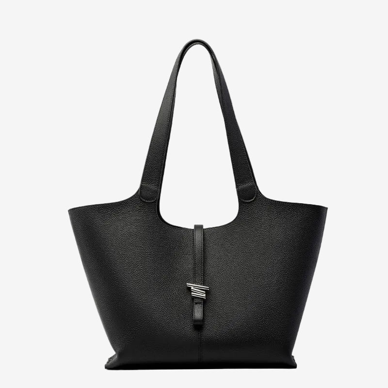 A front view of the Cuirae black genuine leather tote bag standing on a plain background.