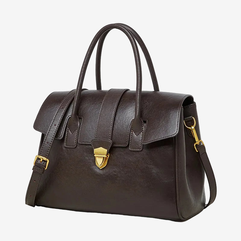 A front view of the Cuirae coffee genuine leather tote bag standing on a plain background.