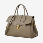 A front view of the Cuirae gry genuine leather tote bag standing on a plain background.