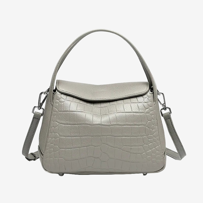 Cuirae gray crocodile embossed genuine leather crossbody bag with flap design and detachable strap, front view on white background