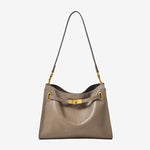 Cuirae  gray genuine leather hobo crossbody bag with gold turnlock hardware, front view on white background
