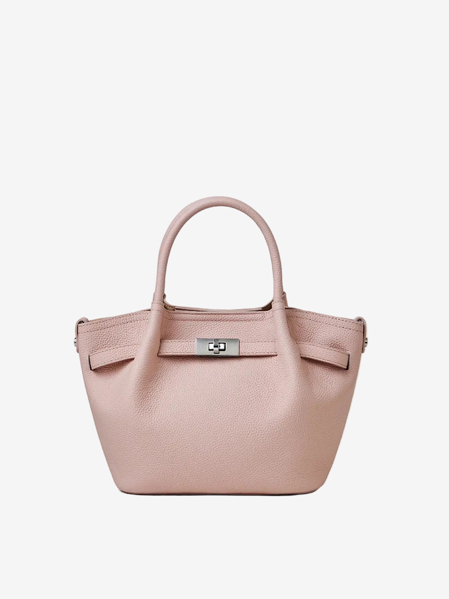 Cuirae light pink pebbled genuine leather kelly crossbody bag with silver turnlock hardware, front view on white background
