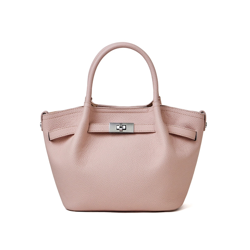 Cuirae light pink pebbled genuine leather kelly crossbody bag with silver turnlock hardware, front view on white background