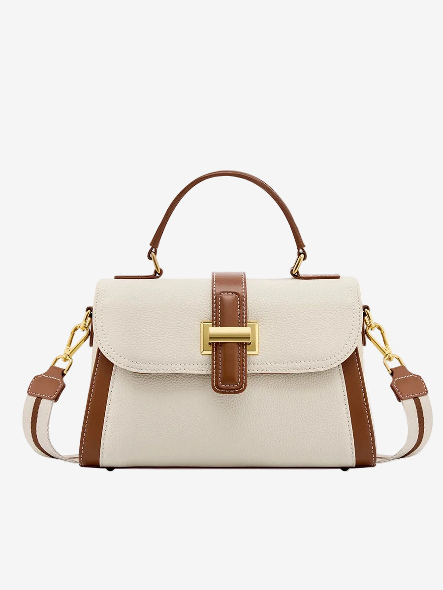 Cuirae off white and brown pebbled leather shoulder bag with gold lock hardware and top handle, front view on white background