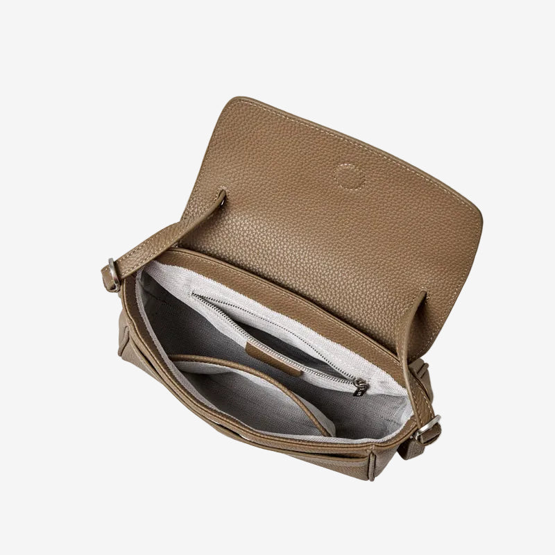 Organized fabric-lined interior of the Cuirae pebbled leather flap shoulder bag